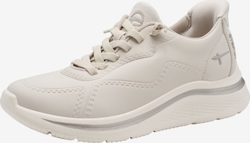 Baskets basses Tamaris en beige : devant