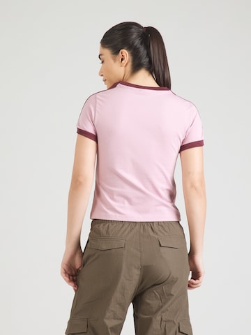 Maglietta 'T7' di PUMA in rosa