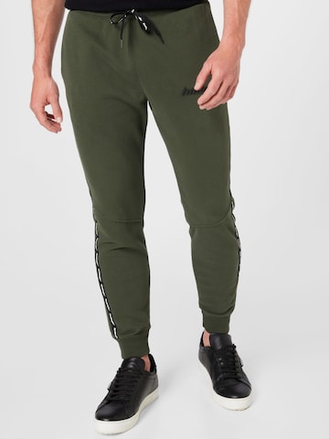 HOLLISTER Slim fit Pants in Green: front