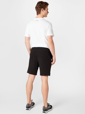 Regular Pantalon de sport PUMA en noir