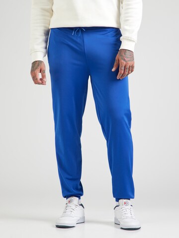 Tapered Pantaloni sportivi 'VECTOR' di Reebok in blu: frontale