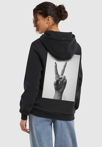 Felpa 'Peace Hand' di Miss Tee in nero: frontale