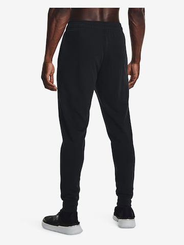 Effilé Pantalon de sport 'Rival Terry' UNDER ARMOUR en noir