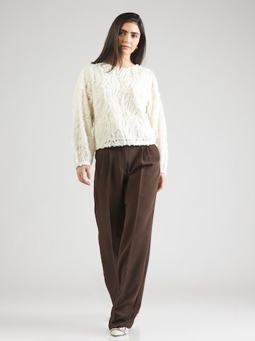 co'couture - Blusa en blanco