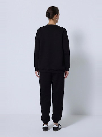 Touche Prive Sweatsuit in Black