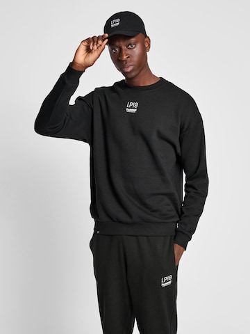 Hummel Sportsweatshirt 'LP10' in Zwart