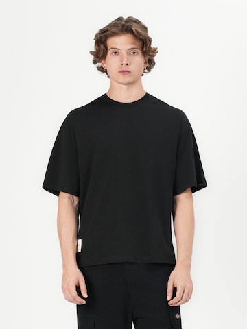 ALPHA INDUSTRIES T-Shirt 'Studio Edition' in Schwarz: Vorderseite