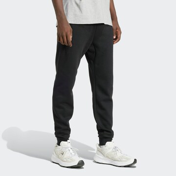 ADIDAS SPORTSWEAR regular Παντελόνι φόρμας 'Essential' σε μαύρο