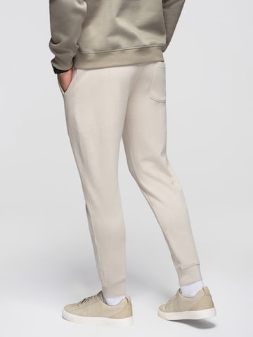 Effilé Pantalon de sport Ombre en gris