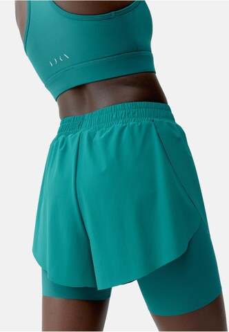Born Living Yoga Skinny Sports trousers 'Bikila' in Green