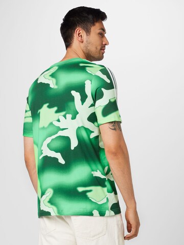 ADIDAS ORIGINALS T-Shirt 'Graphics Camo' in Grün