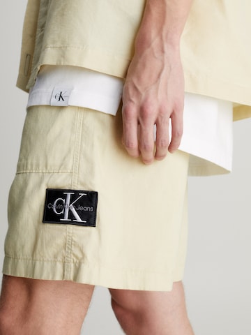 Calvin Klein Jeans Loose fit Pants in Beige