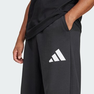 ADIDAS SPORTSWEAR Loosefit Sportsbukser i sort