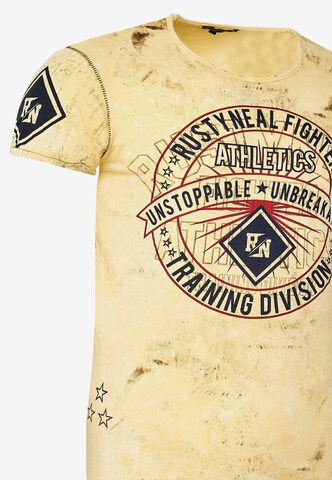 Rusty Neal T-Shirt mit großem Frontprint in Gelb