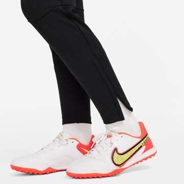 NIKE Regular Workout Pants in Black