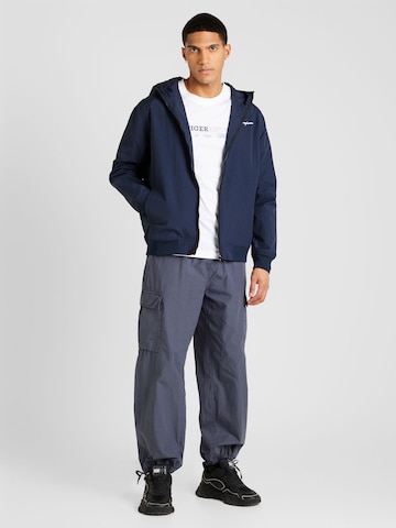 Champion Authentic Athletic Apparel Jacke in Blau