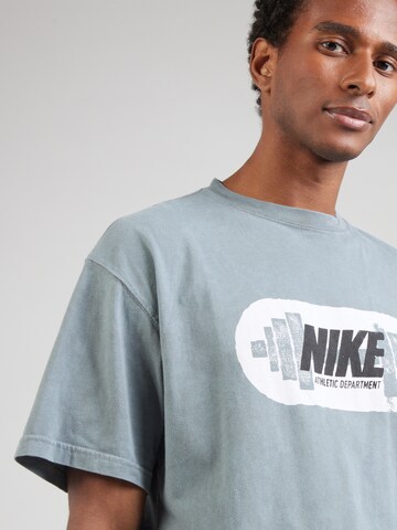 NIKE Functioneel shirt 'M90 GYM HERITAGE' in Grijs