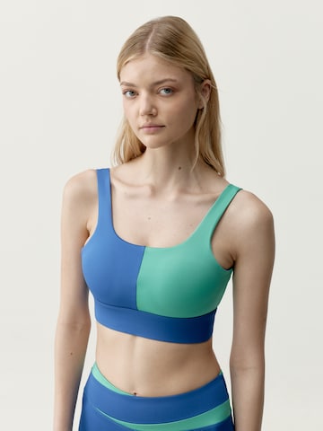 Born Living Yoga Sporttop ' Kate ' in Blauw: voorkant