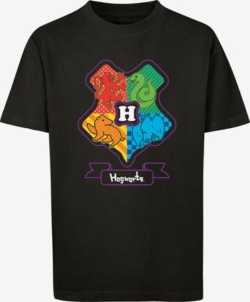 F4NT4STIC Shirt 'Harry Potter Junior Hogwarts Crest Color' in Zwart: voorkant