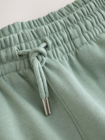 Effilé Pantalon fonctionnel Next en vert