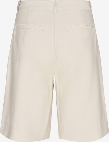 regular Pantaloni con pieghe di minimum in beige