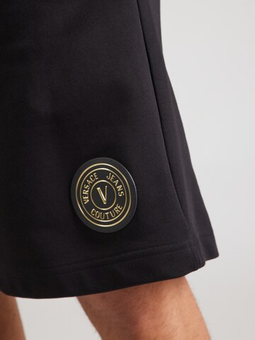 Versace Jeans CoutureLoosefit Hlače - crna boja