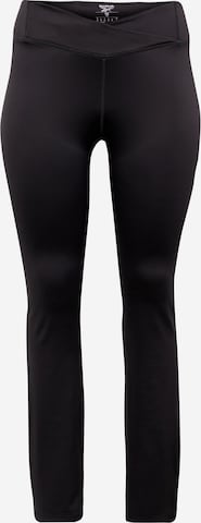 Reebok Flared Sports trousers in Black: front