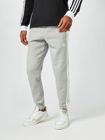 ADIDAS ORIGINALS Дънки Tapered Leg Панталон 'Adicolor Classics 3-Stripes' в сиво: отпред