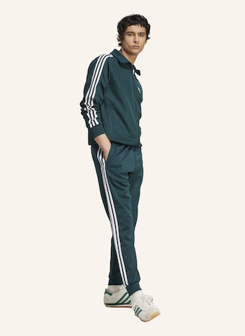 ADIDAS ORIGINALS Tapered Trousers in Green