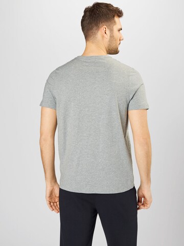 PUMA Performance Shirt 'Essentials' in Grey