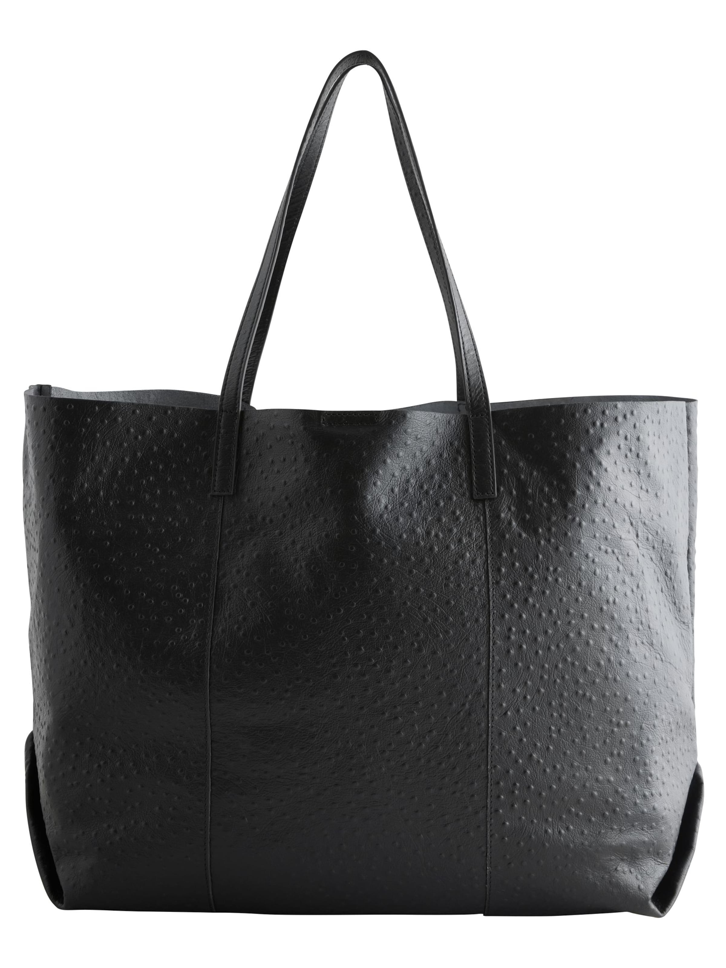 Next Ostoskassi värissä musta: etupuoli