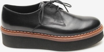 Tod's Flats & Loafers in 36 in Black: front