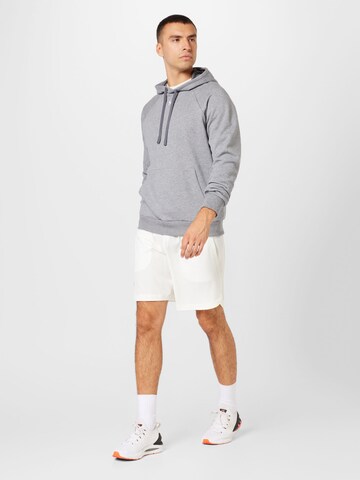 Sweat de sport UNDER ARMOUR en gris