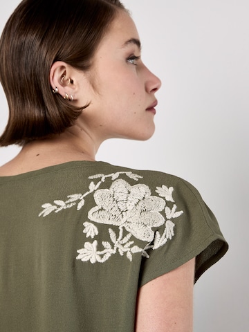 Chemisier Apricot en vert