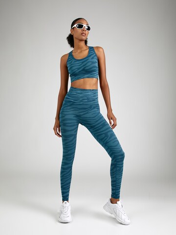 Skinny Pantaloni sportivi di HKMX in blu