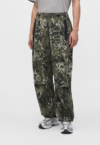 Nike Sportswear Wide leg Pants 'TCH' in Green: front