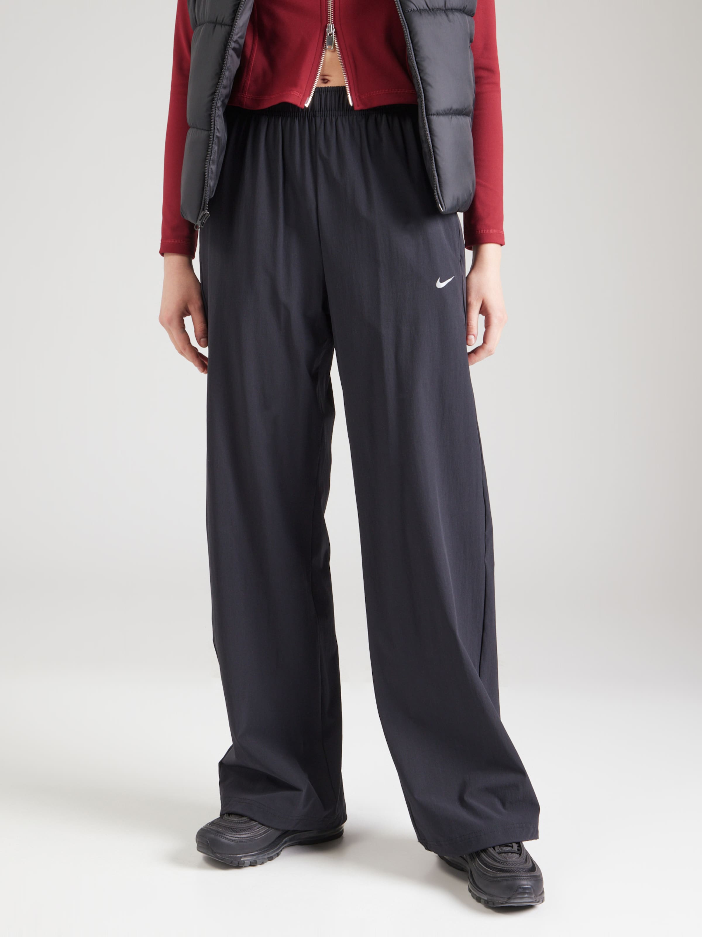 Nike Sportswear Loose fit Trousers in Black | ABOUT YOU