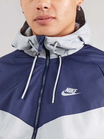 Nike Sportswear Between-season jacket in Grey