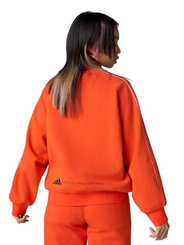 Jachetă de trening de la ADIDAS BY STELLA MCCARTNEY pe portocaliu