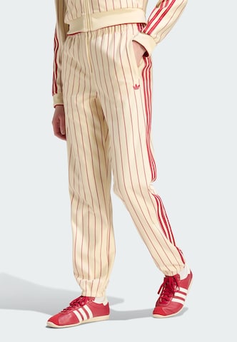 Tapered Pantaloni 'Firebird' di ADIDAS ORIGINALS in beige: frontale