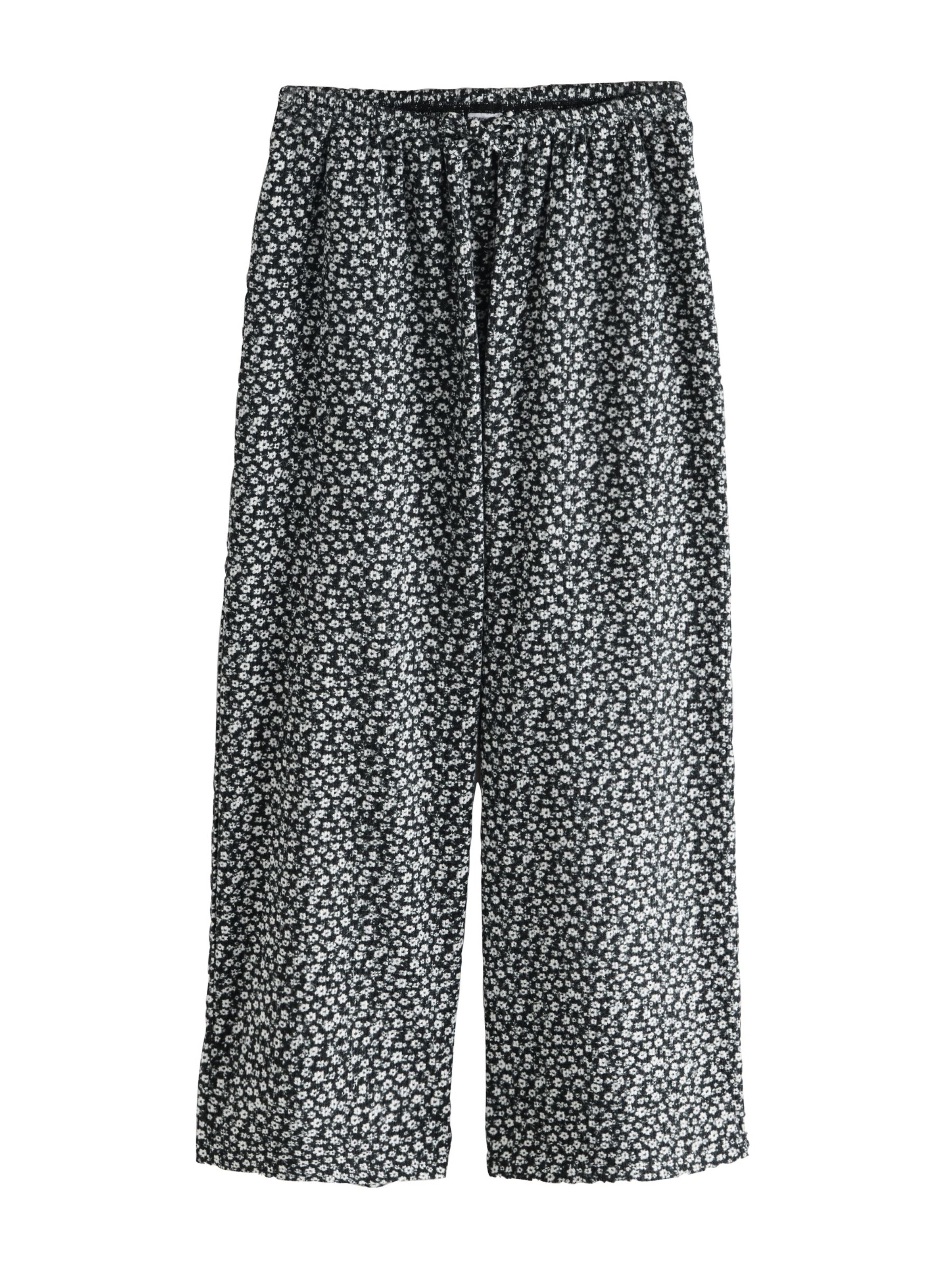 Next Nohavice - Čierna: predná strana