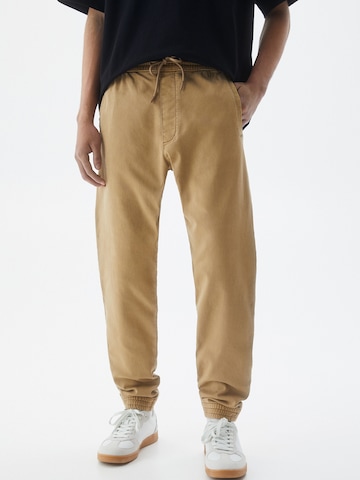 Pull&Bear Tapered Pants in Brown: front