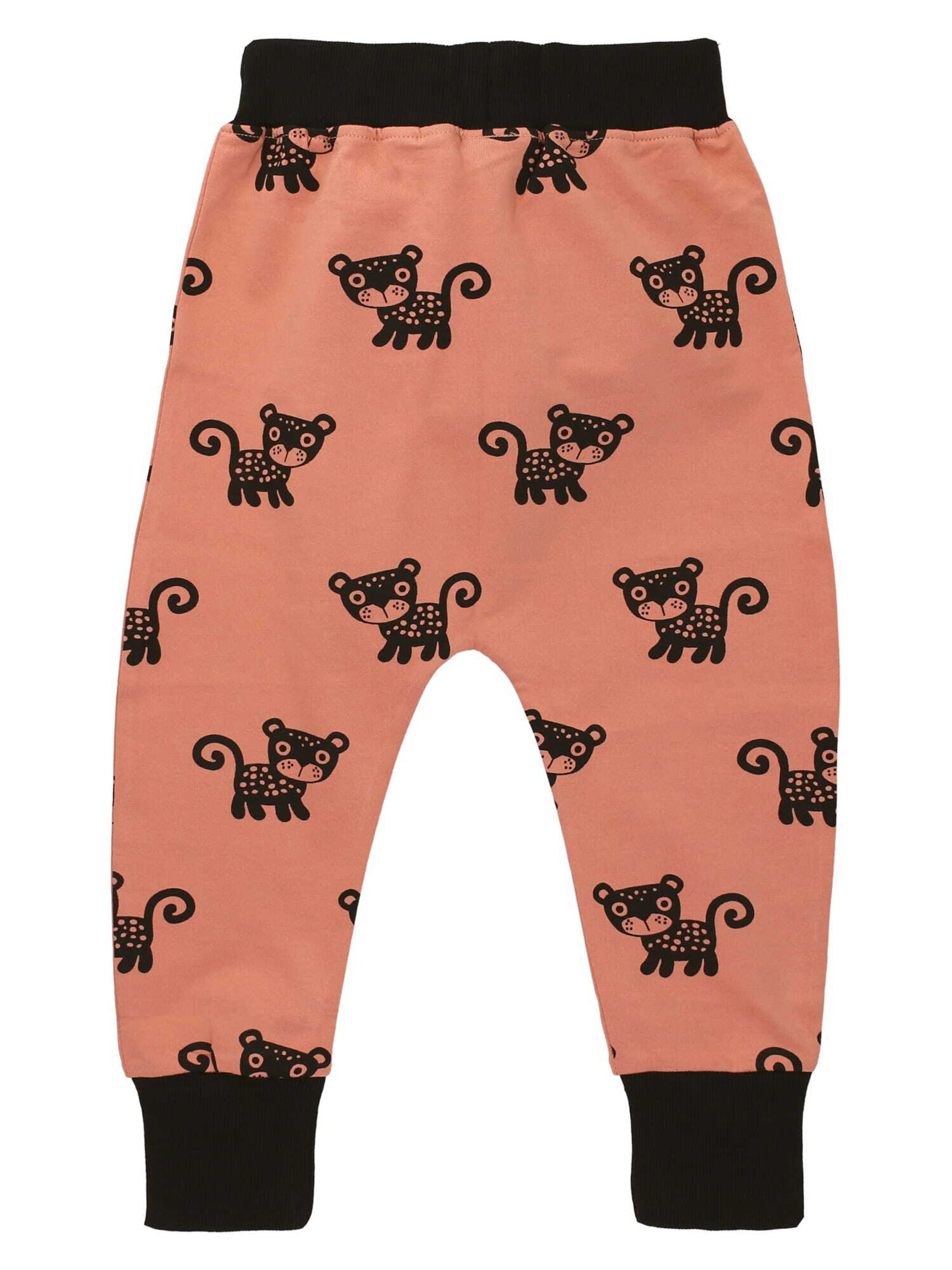 Turtledove London Tapered Trousers in Orange: front