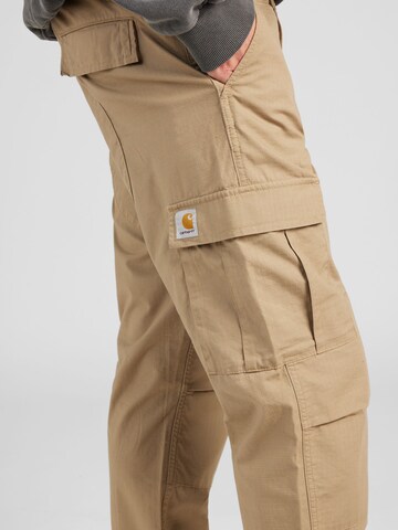 Carhartt WIP Ohlapna forma Kargo hlače | rjava barva