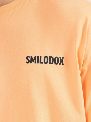 T-Shirt ' Cyris ' Smilodox en orange