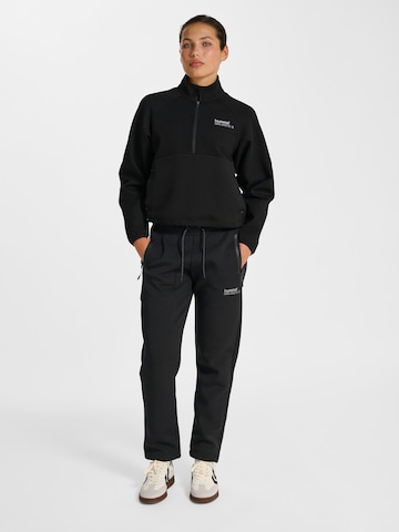 Hummel Regular Sports trousers in Black