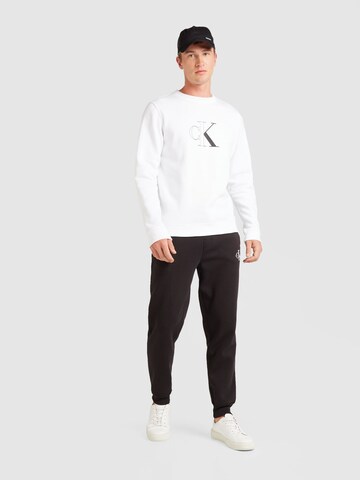 Tapered Pantaloni di Calvin Klein Jeans in nero