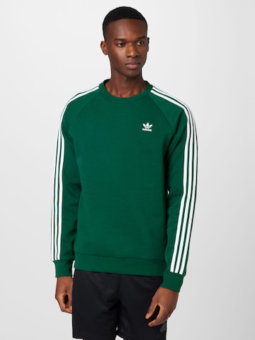 ADIDAS ORIGINALSSweater majica 'Adicolor Classics 3-Stripes' - zelena boja: prednji dio