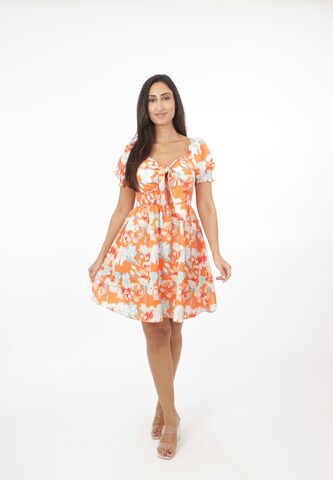 Elara Kjole i orange