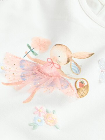 Set Next en rose